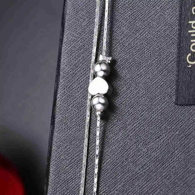 Zartes Silber Fußkettchen mit eingearbeiteten Herzchen